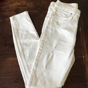 DISTRESSED HIGH-RISE SKINNY JEANS